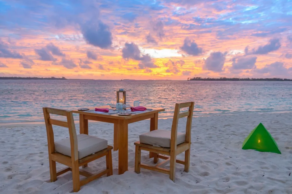 candlelit dinner on a secluded sandbank in maldives at night 1